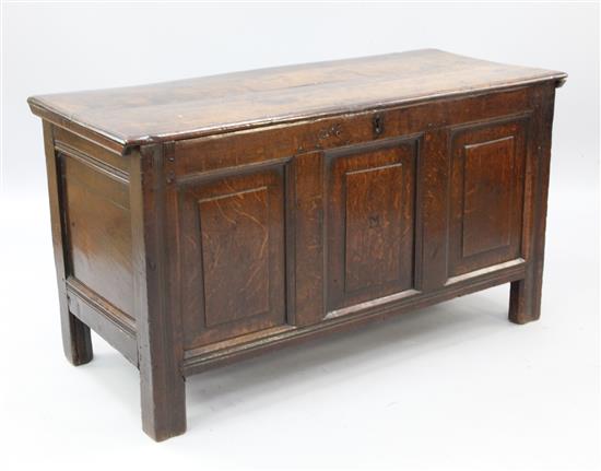 An 18th century oak coffer, W.4ft 2in.